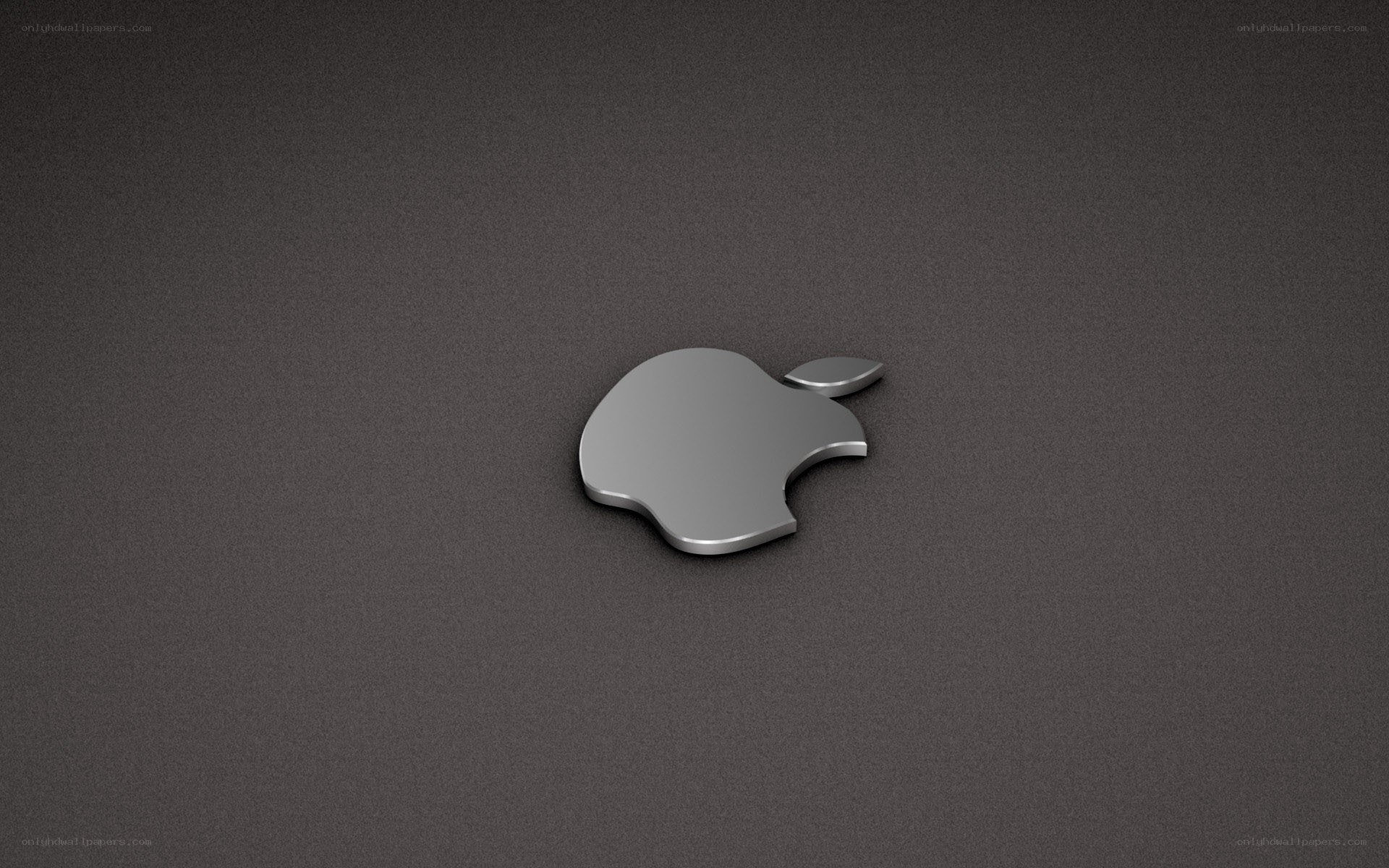 Apple logo on dark surface