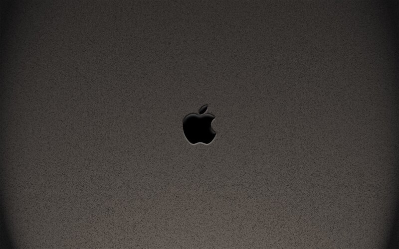 Apple logo on dark surface