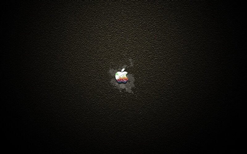 Apple logo on dark texture