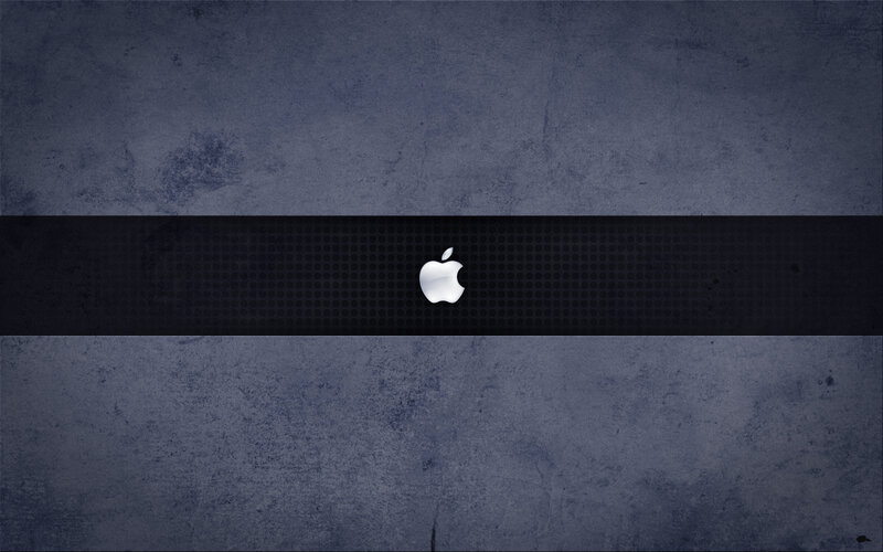 Apple logo on dark textured background