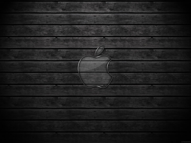 Apple logo on dark wood