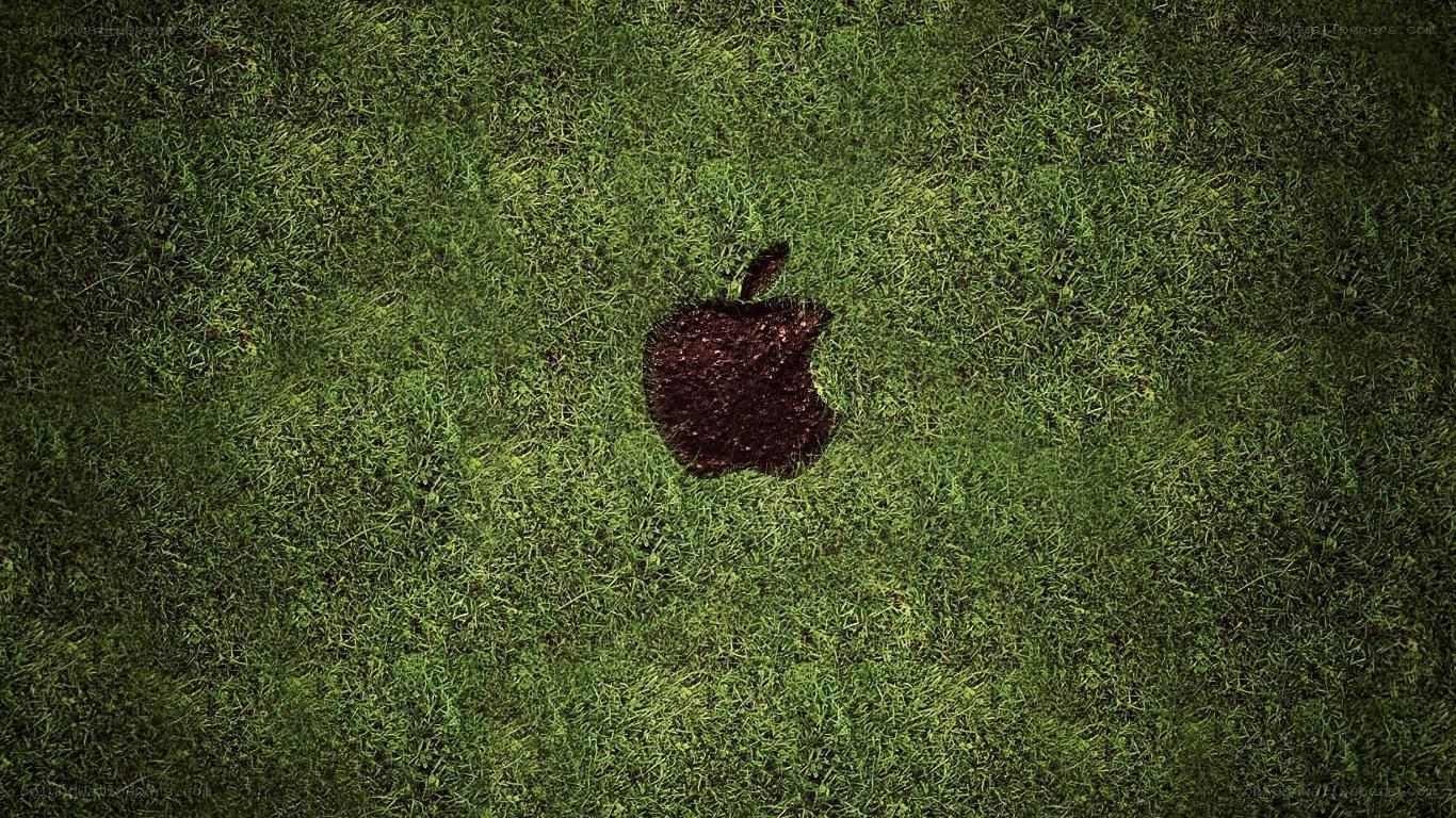 Apple logo on grass