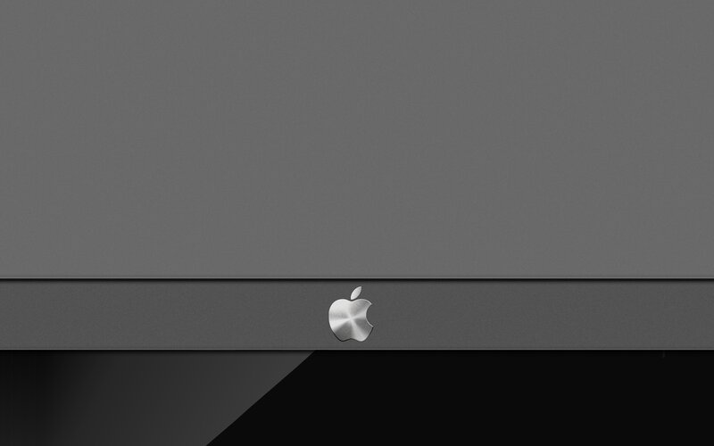 Apple logo on gray surface