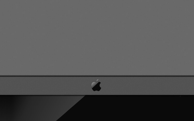 Apple logo on gray surface