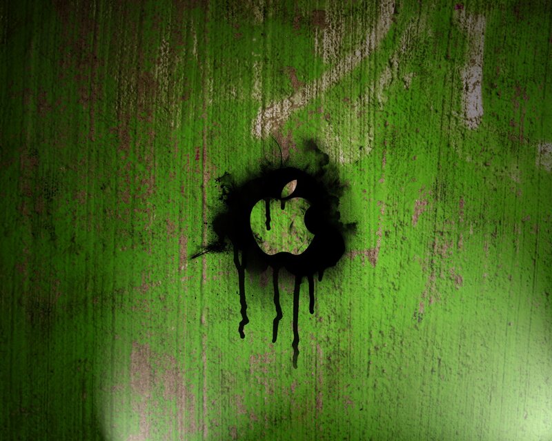 Apple logo on green wall