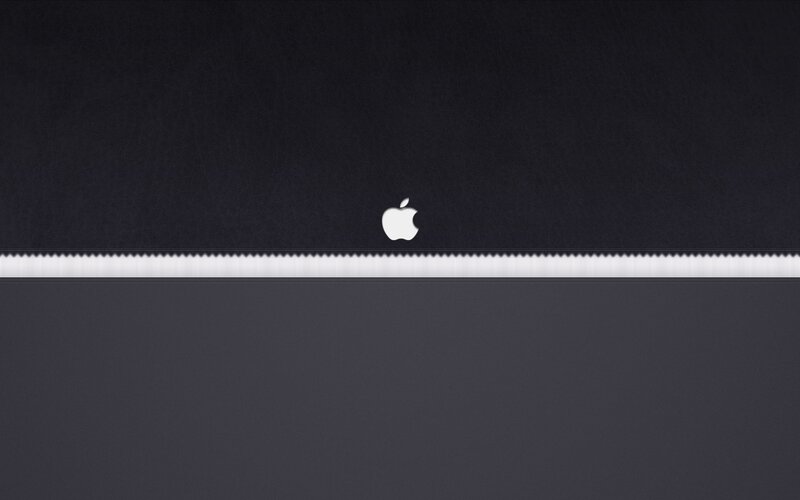 Apple Logo on Laptop — Black, Neutral
