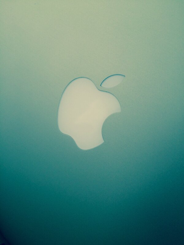 Apple Logo on Laptop — Teal