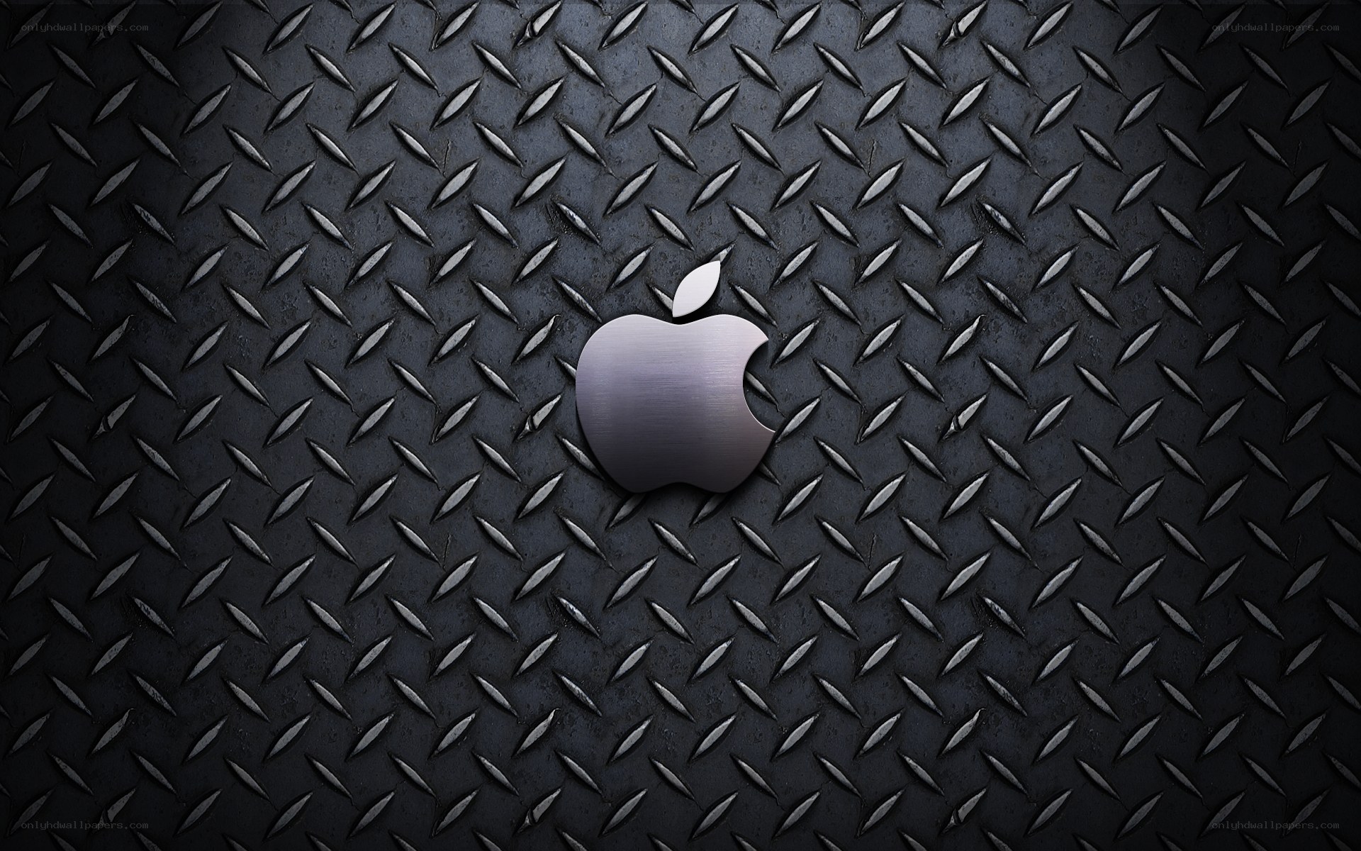 Apple logo on metal surface