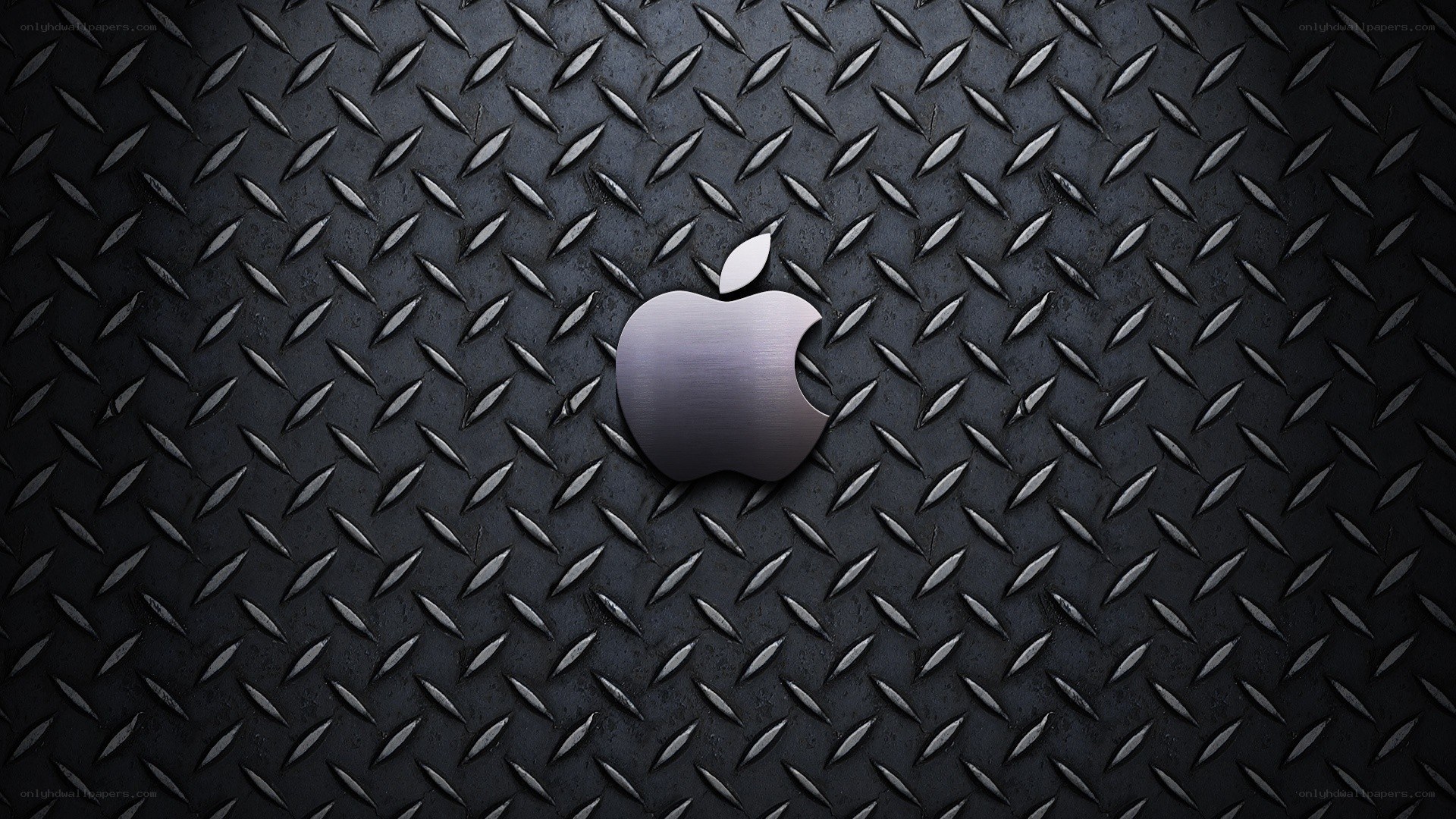 Apple logo on metal surface