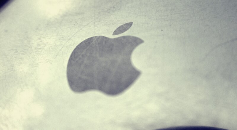 Apple logo on metal surface