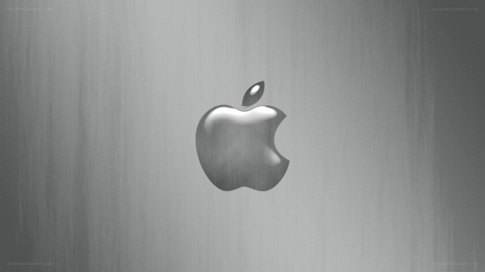 Apple logo on metal surface