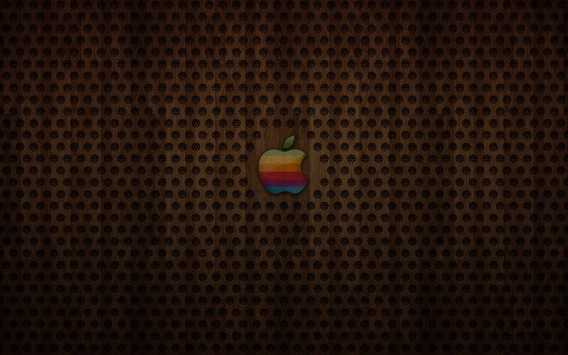 Apple logo on perforated wood