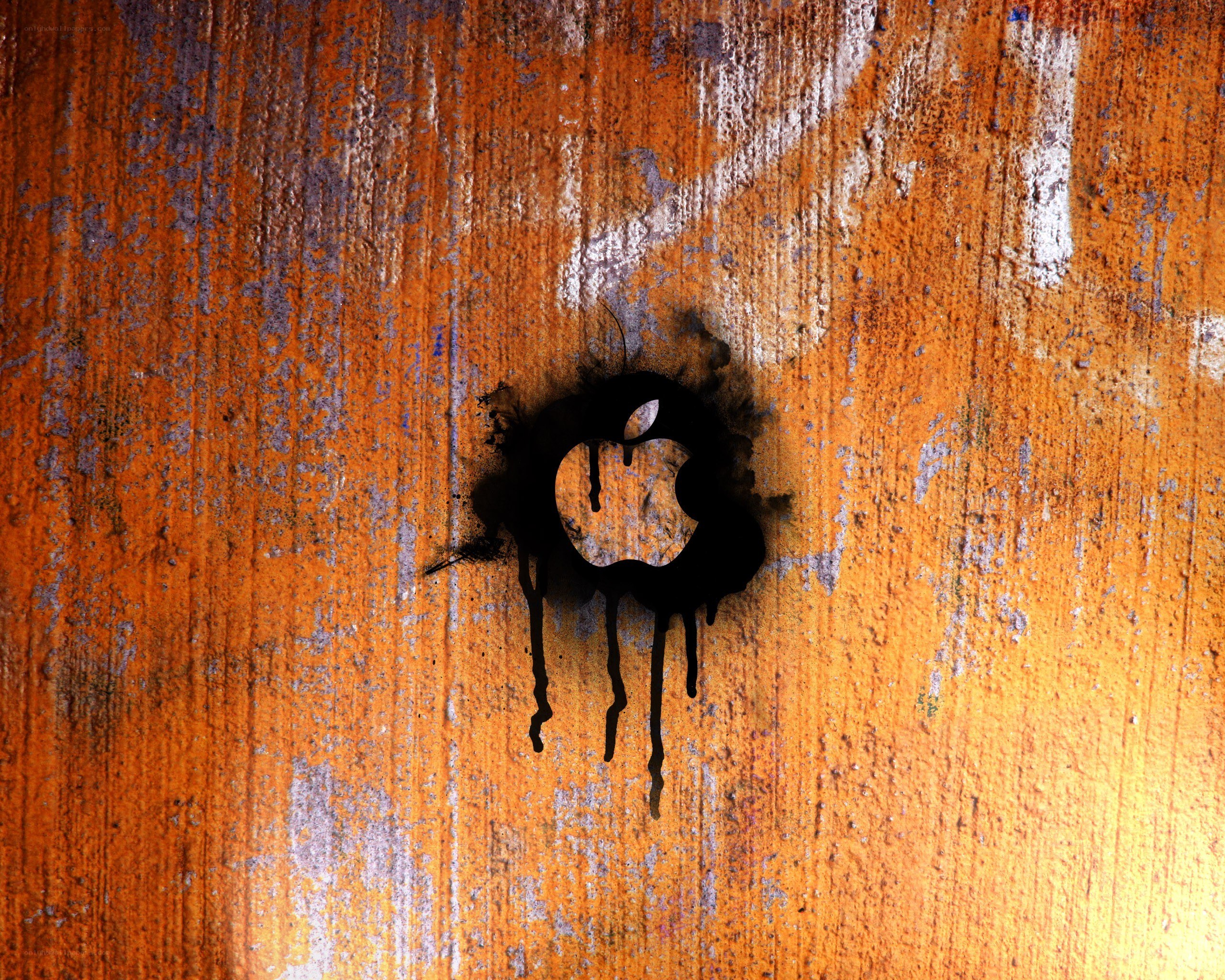 Apple logo on rusted metal