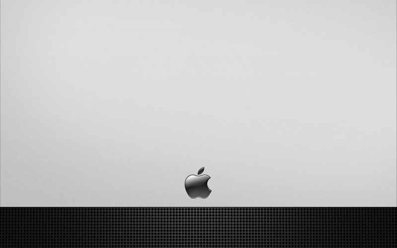 Apple logo on silver laptop