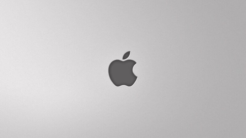 Apple logo on silver surface