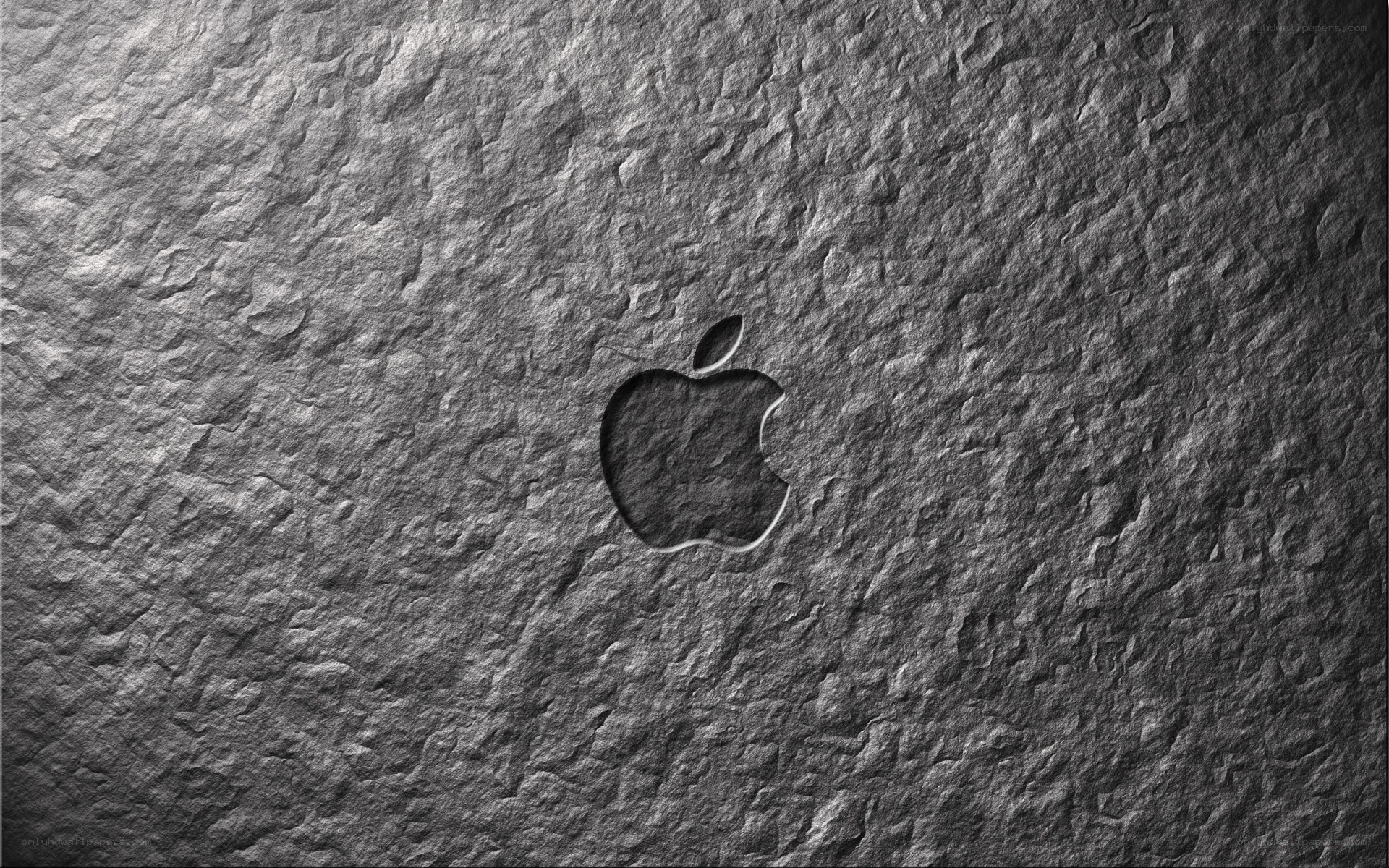 Apple logo on stone texture