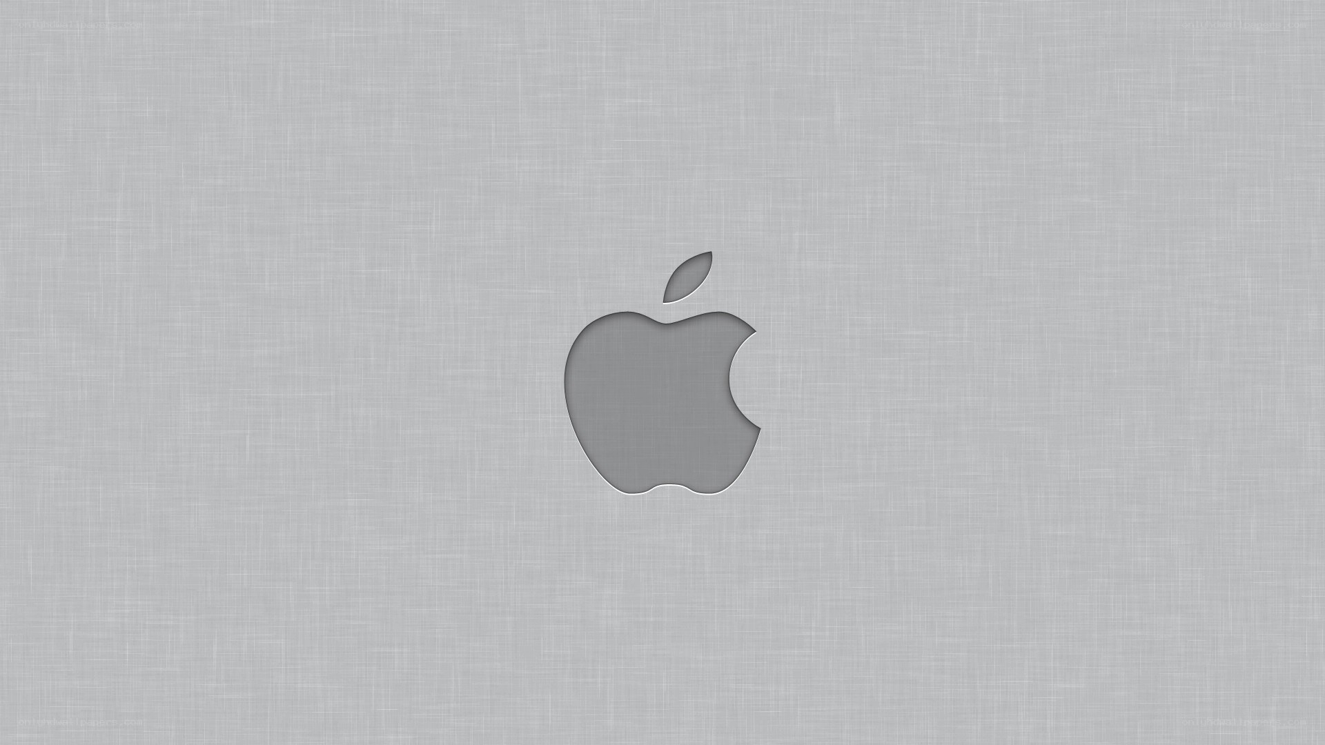 Apple logo on textured background
