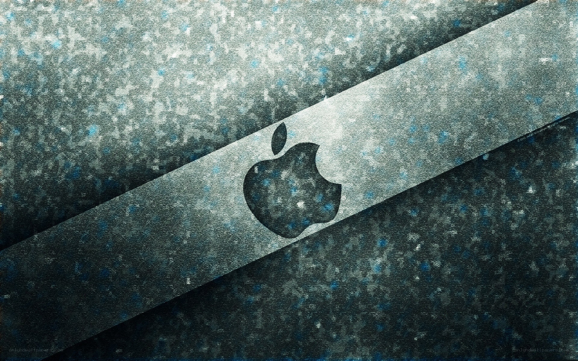 Apple logo on textured background