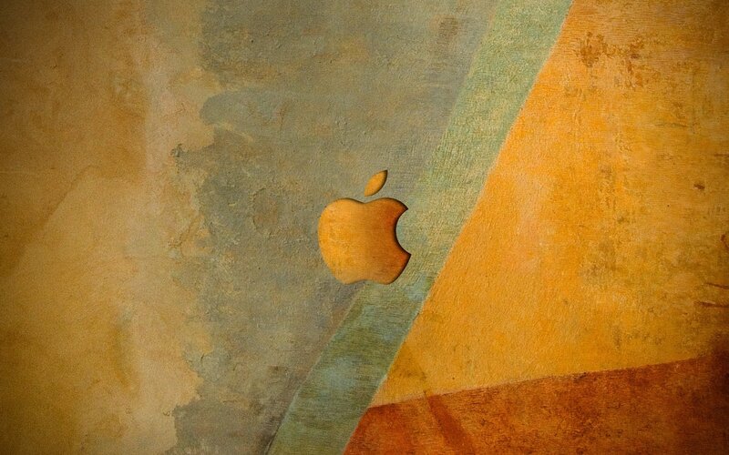 Apple Logo on Textured Wall — Brown
