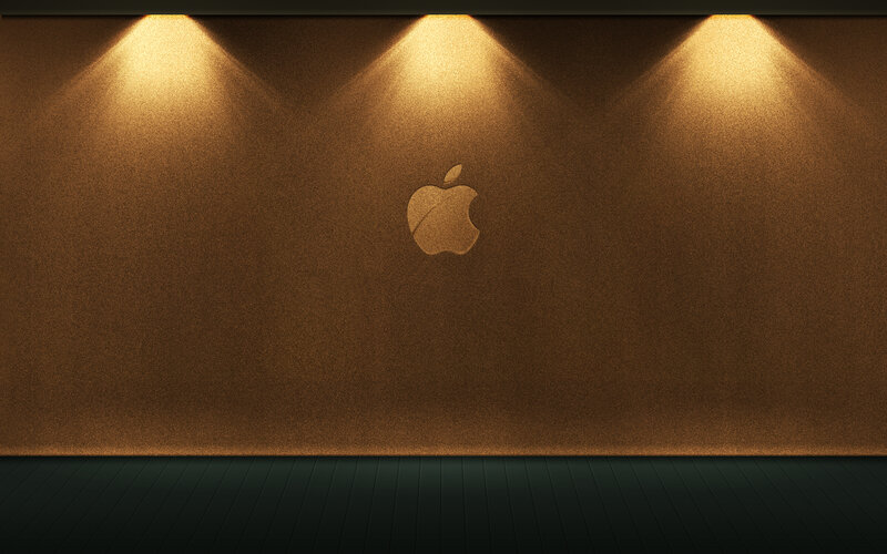 Apple logo on textured wall