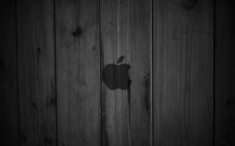 Apple logo on wood texture