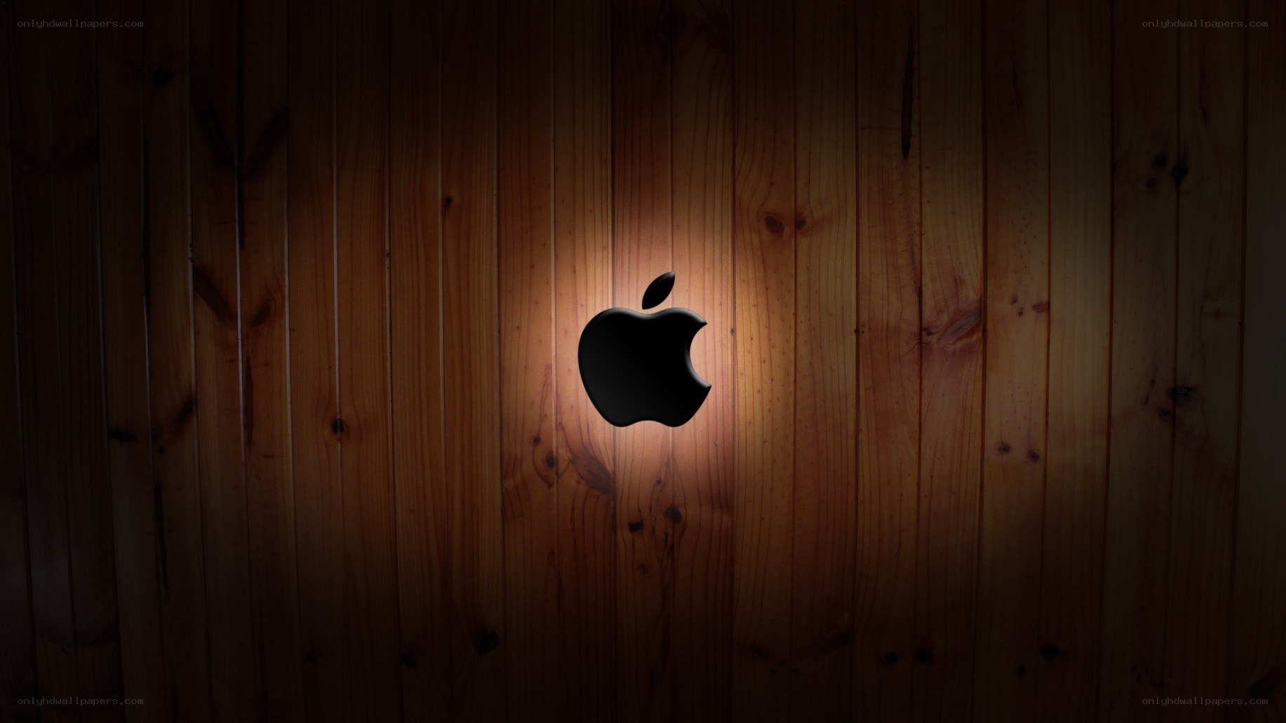 Apple logo on wood wall