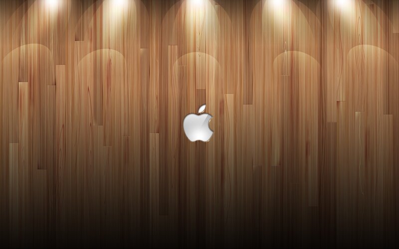 Apple logo on wood wall