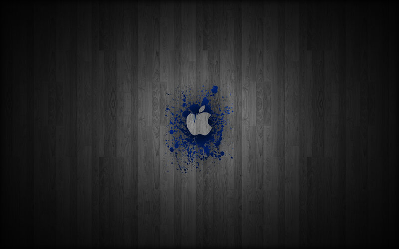 Apple logo splatter on wood