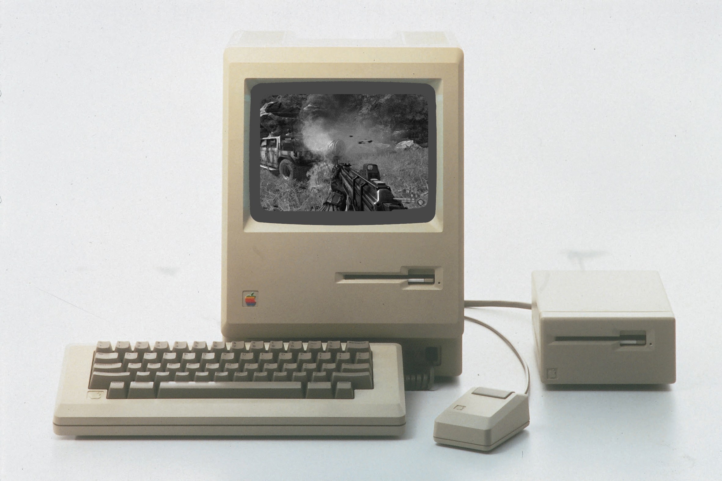 Apple Macintosh with game on screen