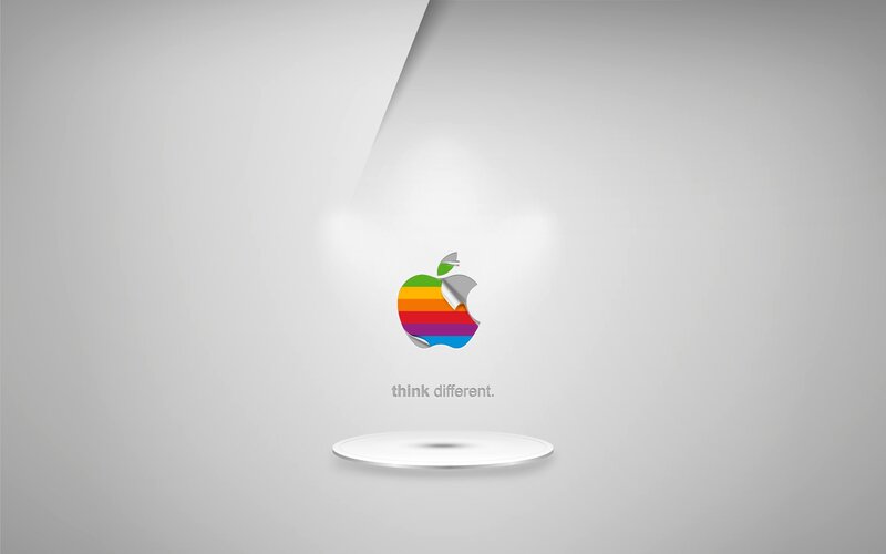 Apple rainbow logo with tagline