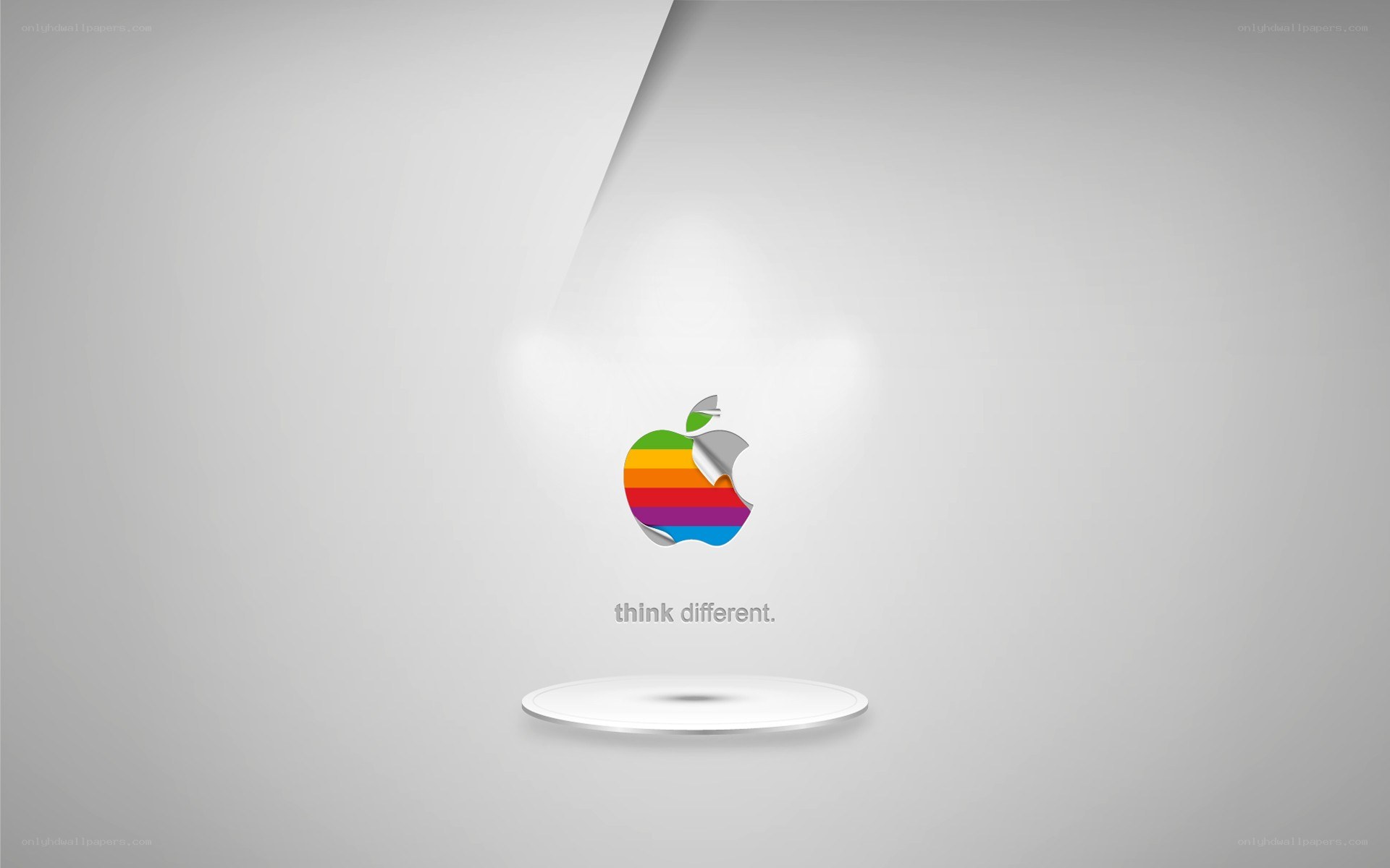 Apple rainbow logo with tagline