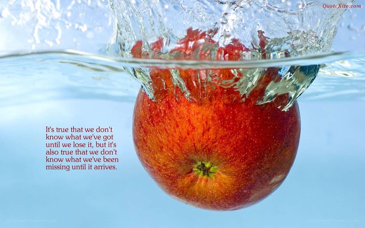 apple splashing in water
