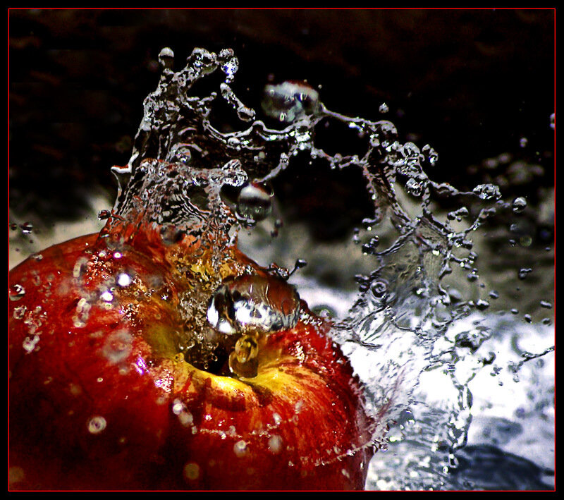 apple splashing in water