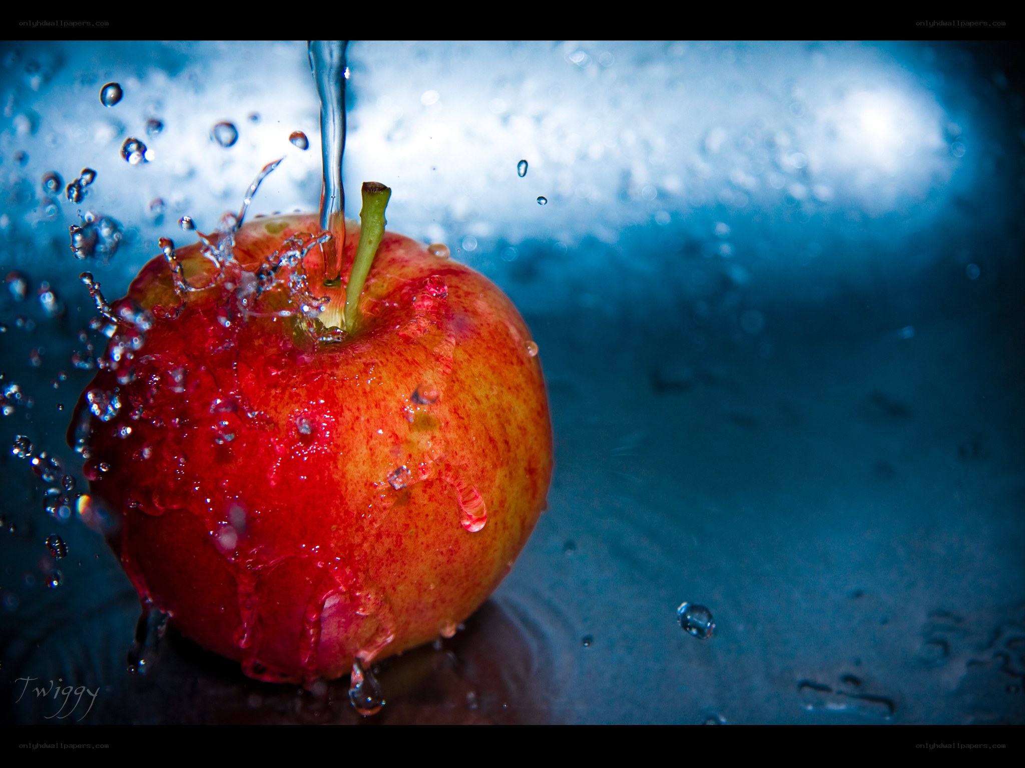 apple splashing in water