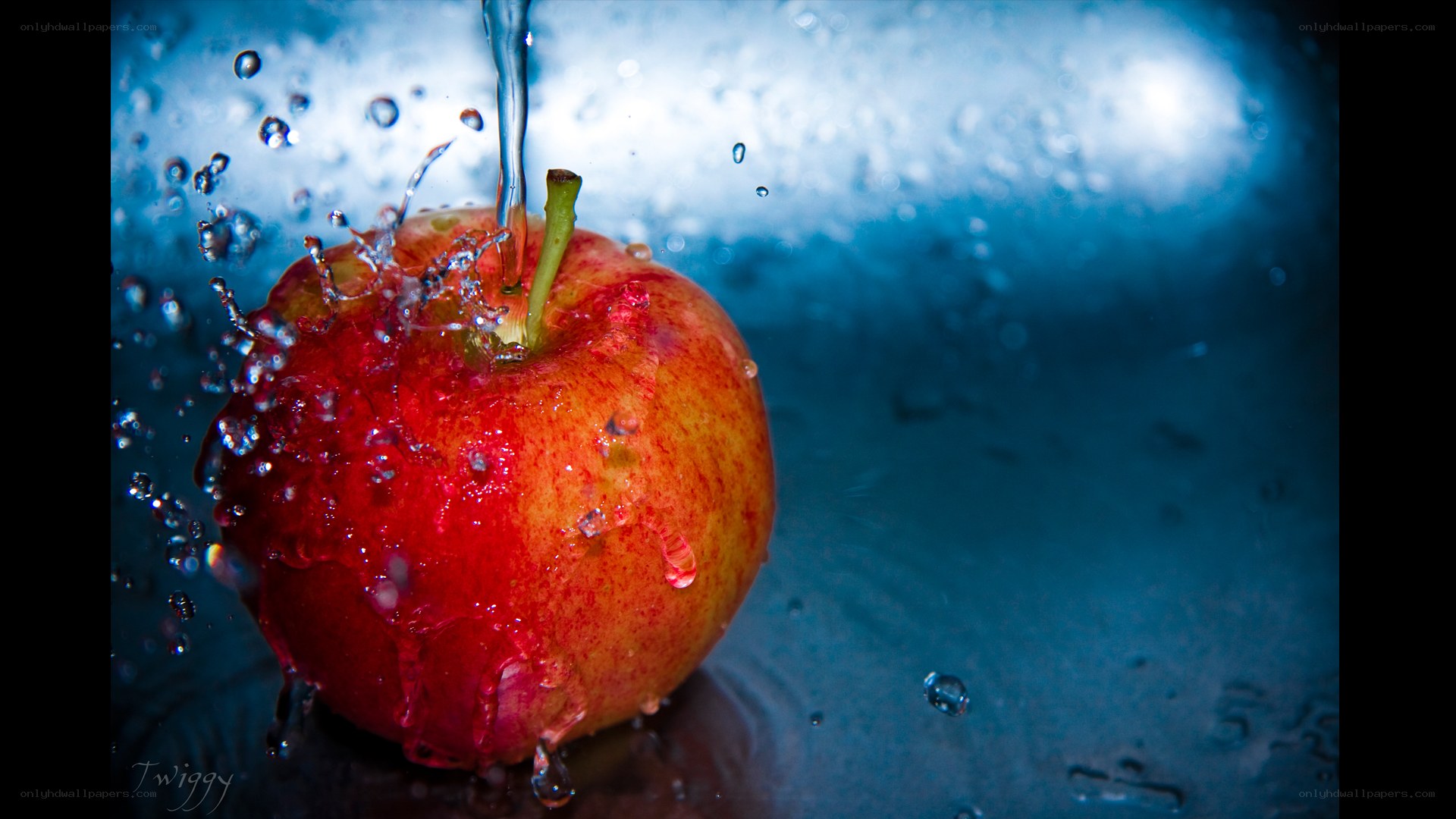 apple splashing in water
