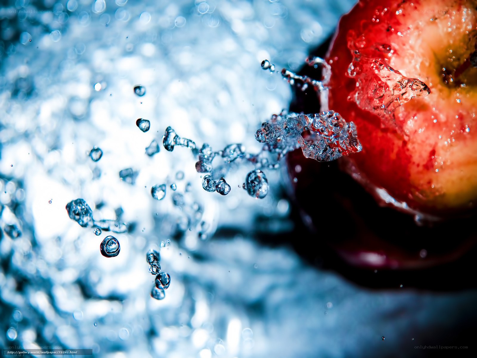 apple splashing in water