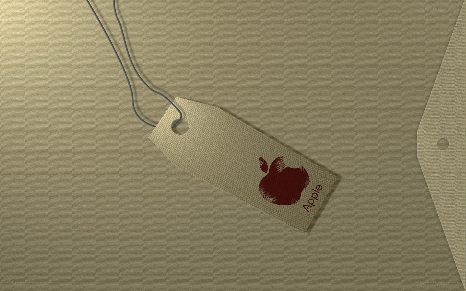 Apple tag on textured surface