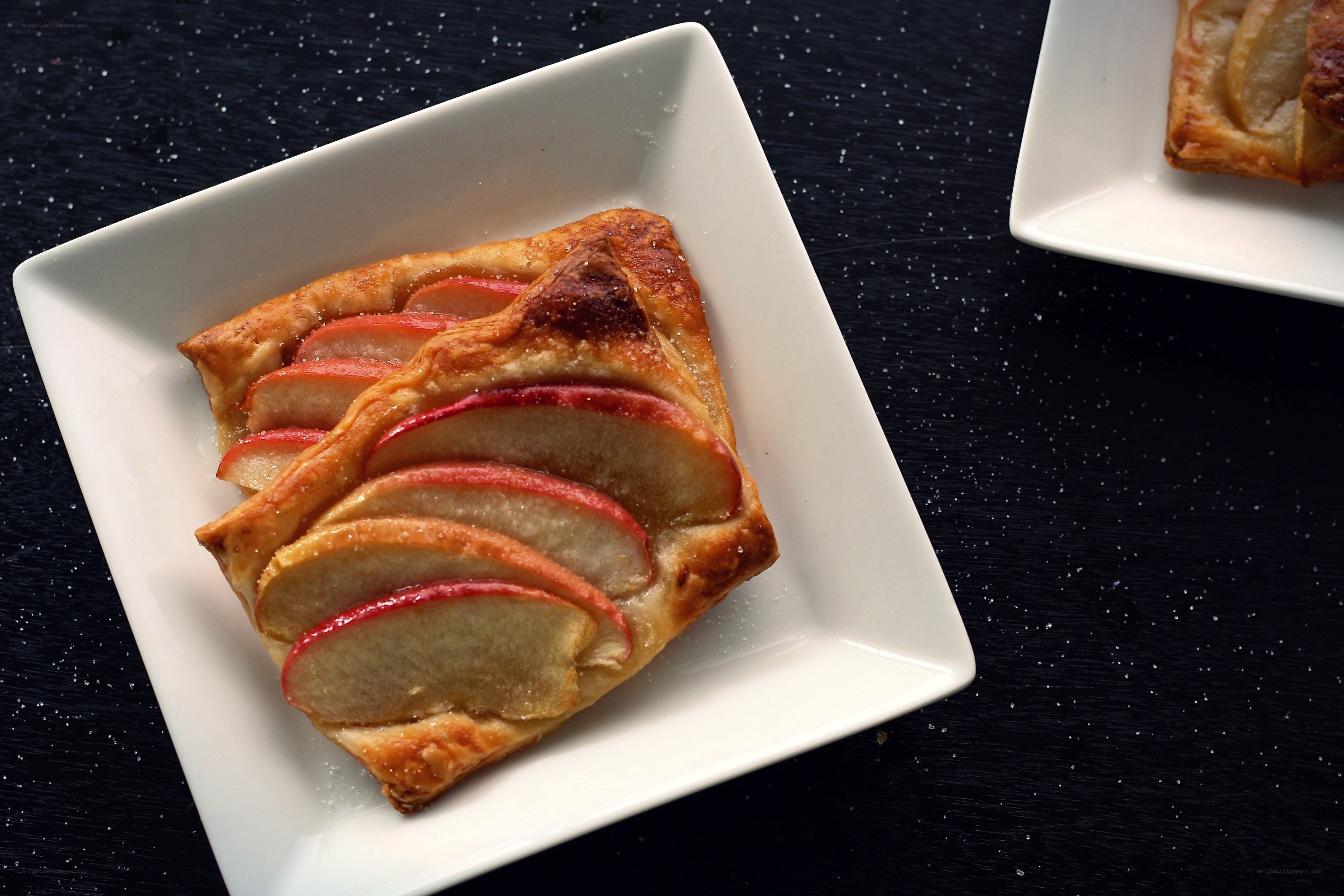 Apple tart on white plate
