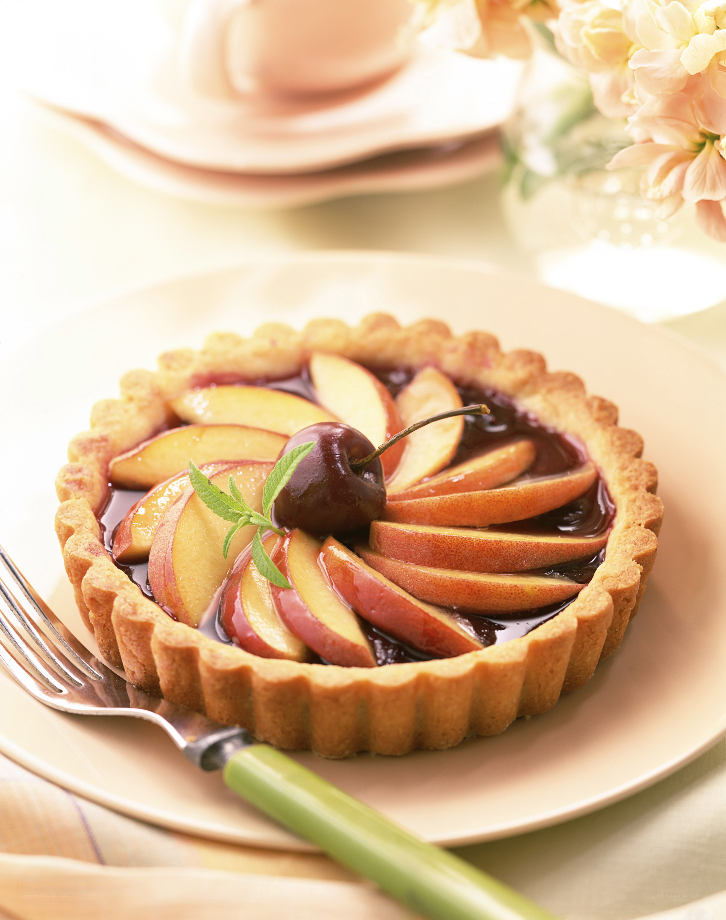 Apple tart with cherry and mint