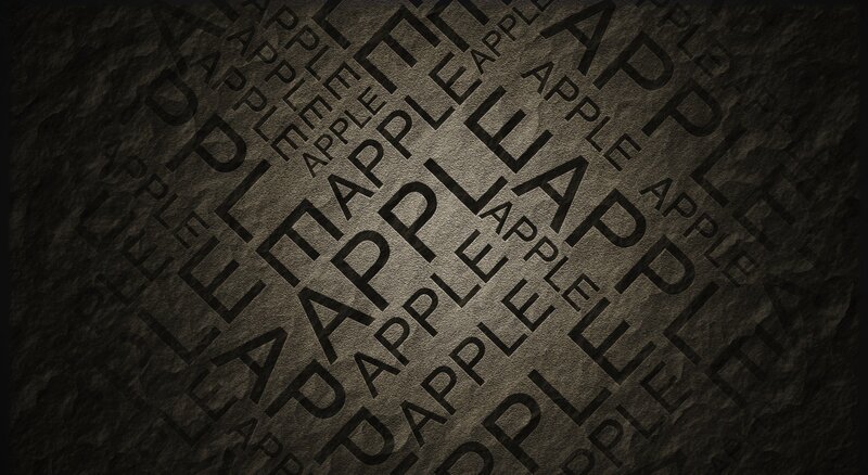 Apple text pattern on stone
