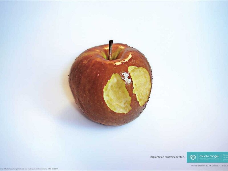Apple with dental implants