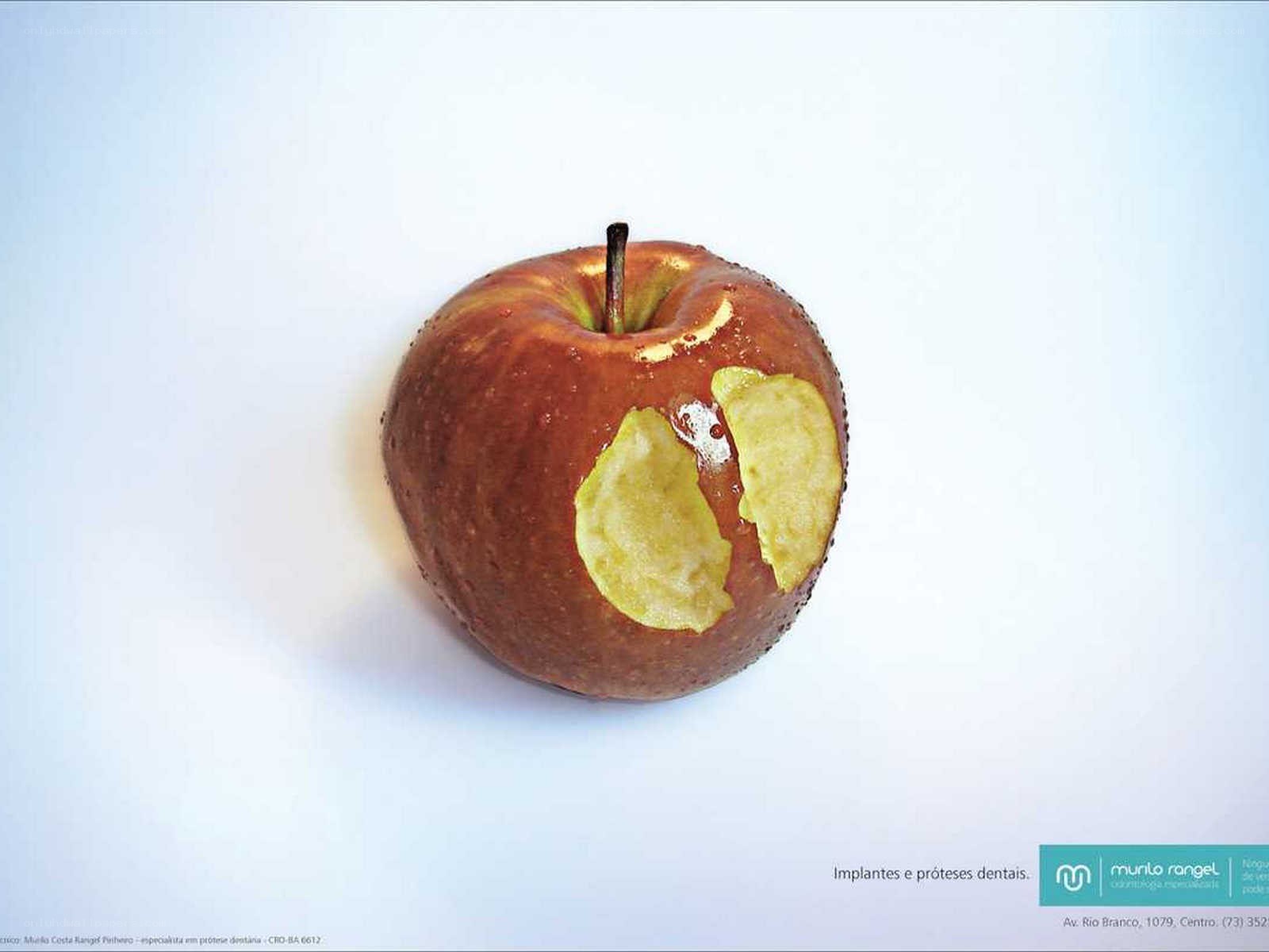 Apple with dental implants