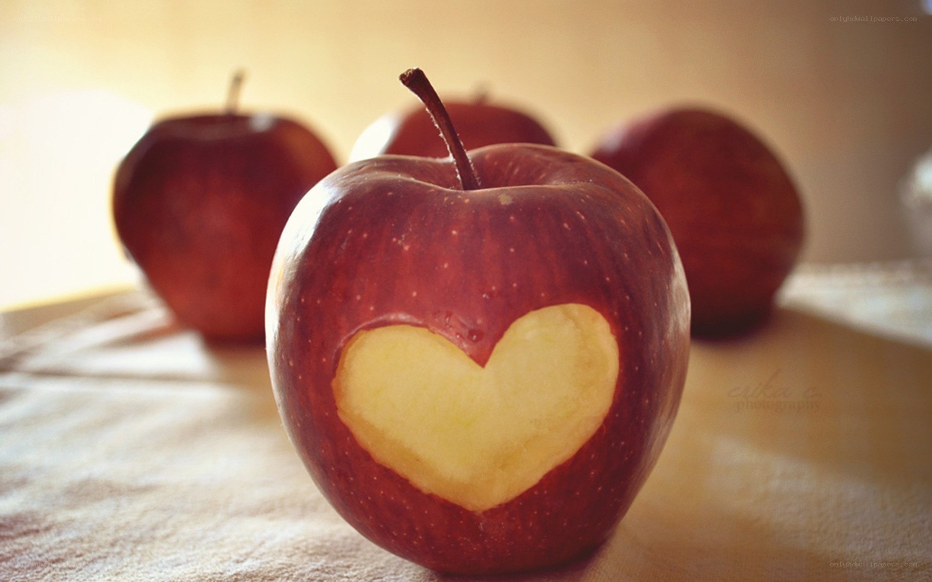 apple with heart carved in it