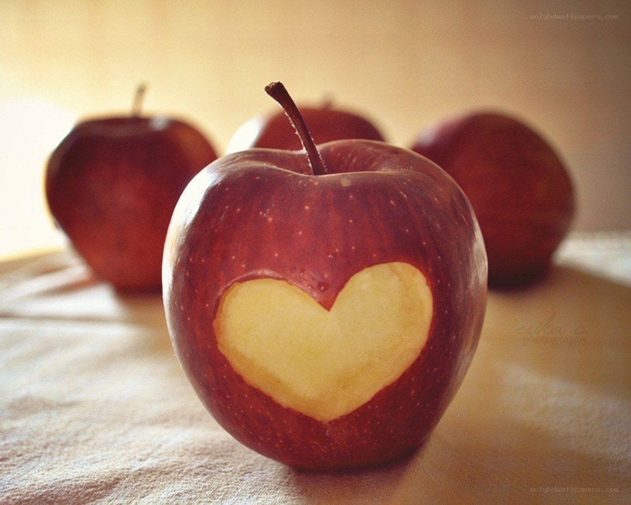 apple with heart carved in it