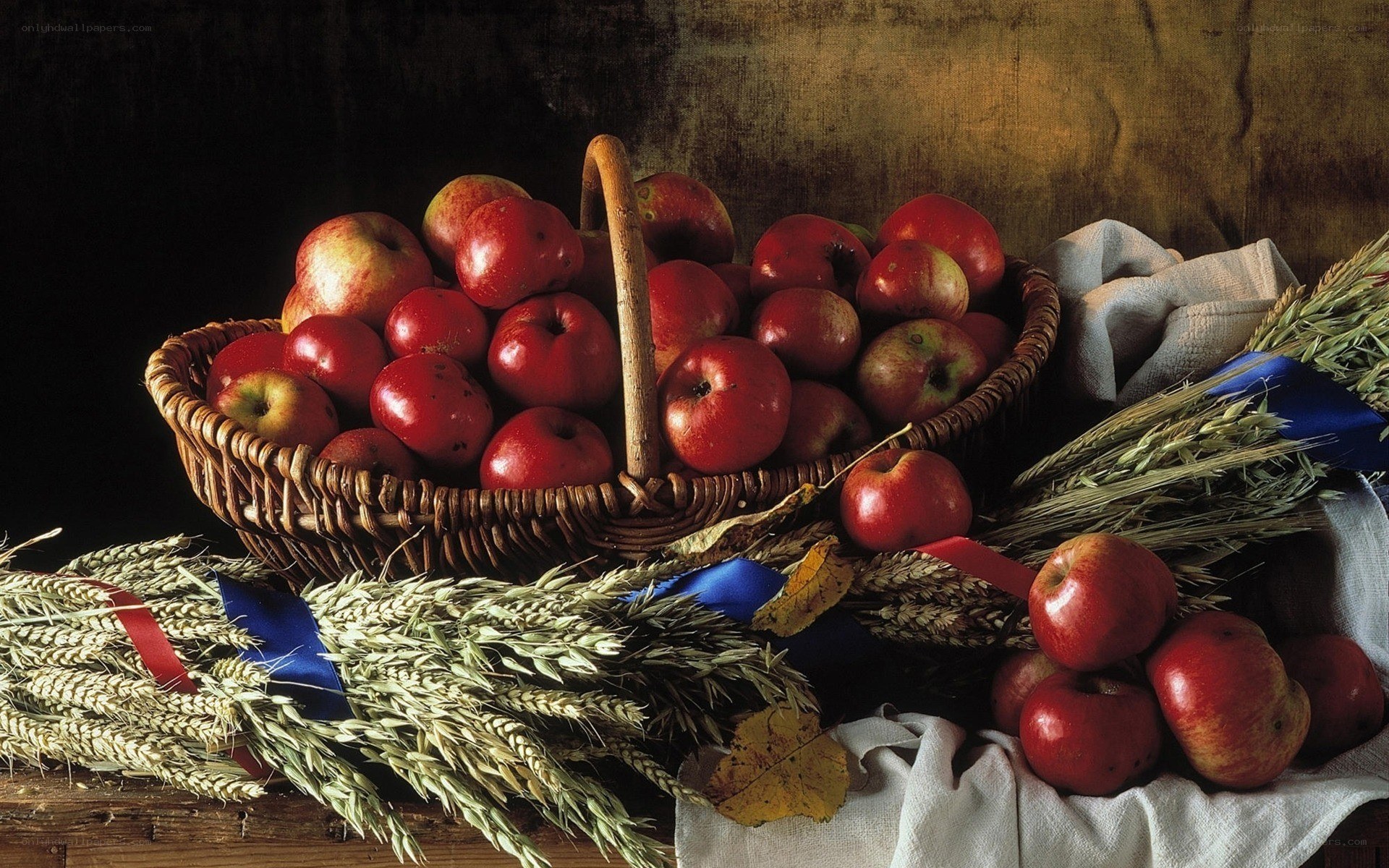 Apples and wheat in a basket