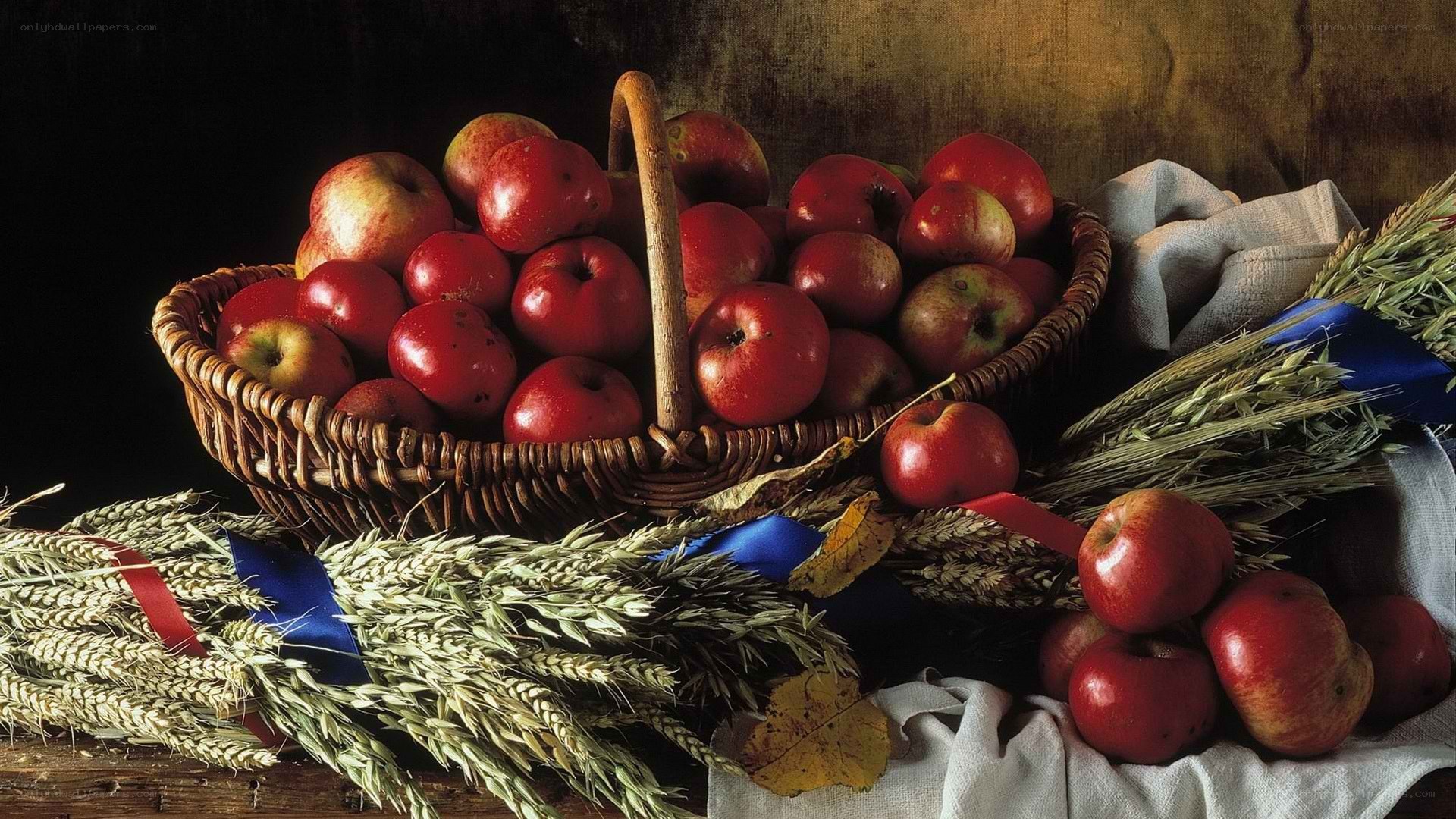 Apples and wheat in a basket