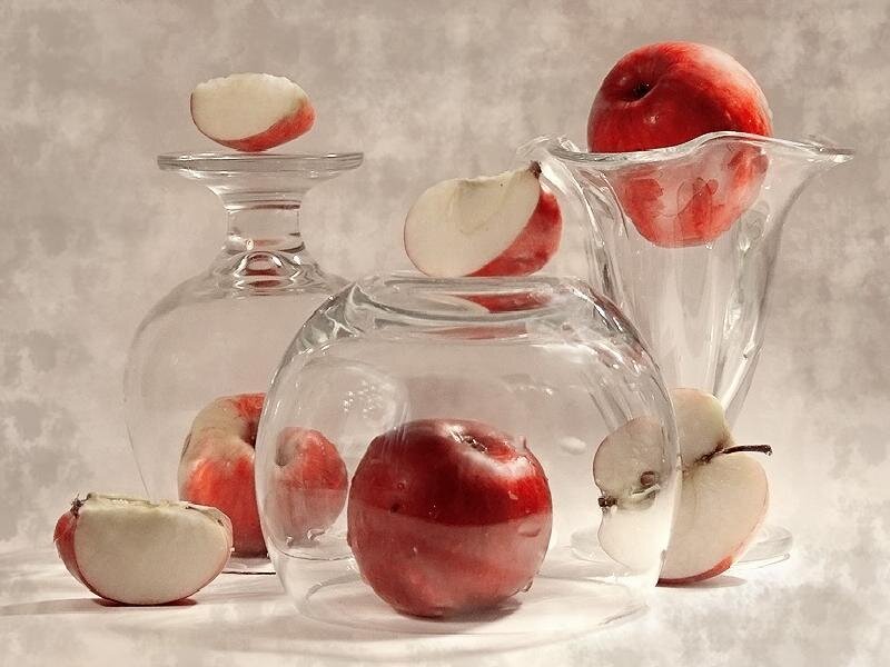 Apples in glass containers