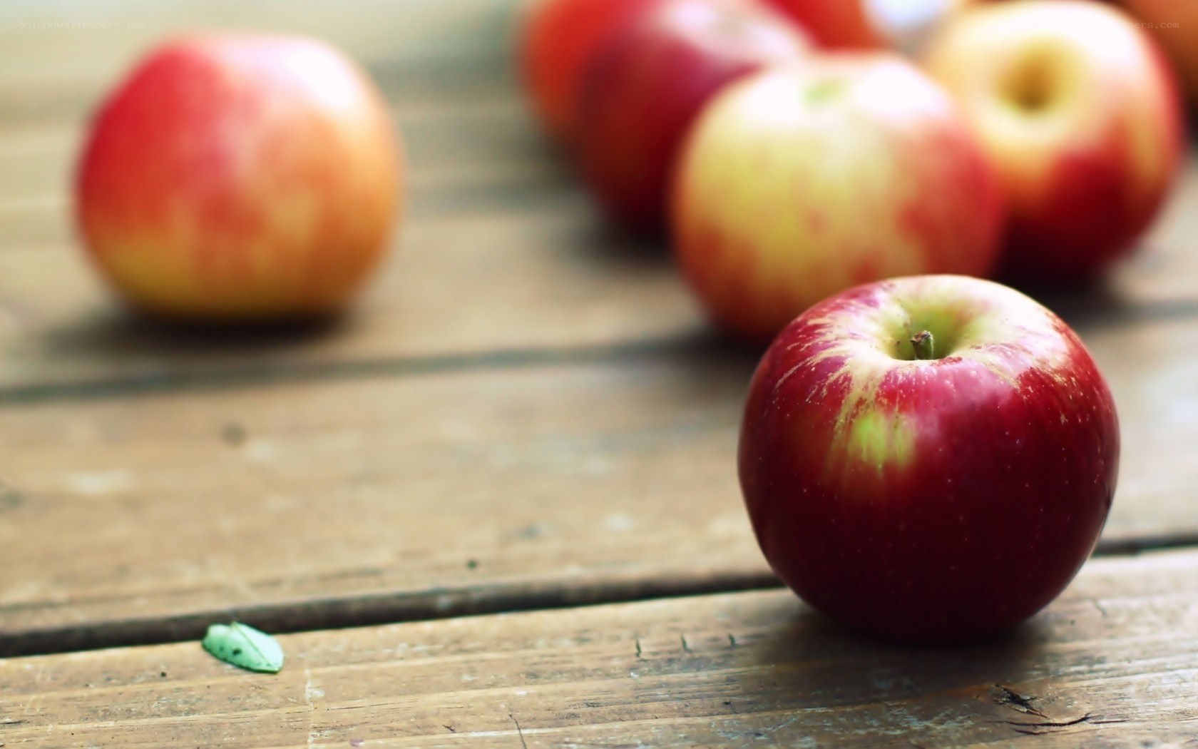 Apples on a wooden table
