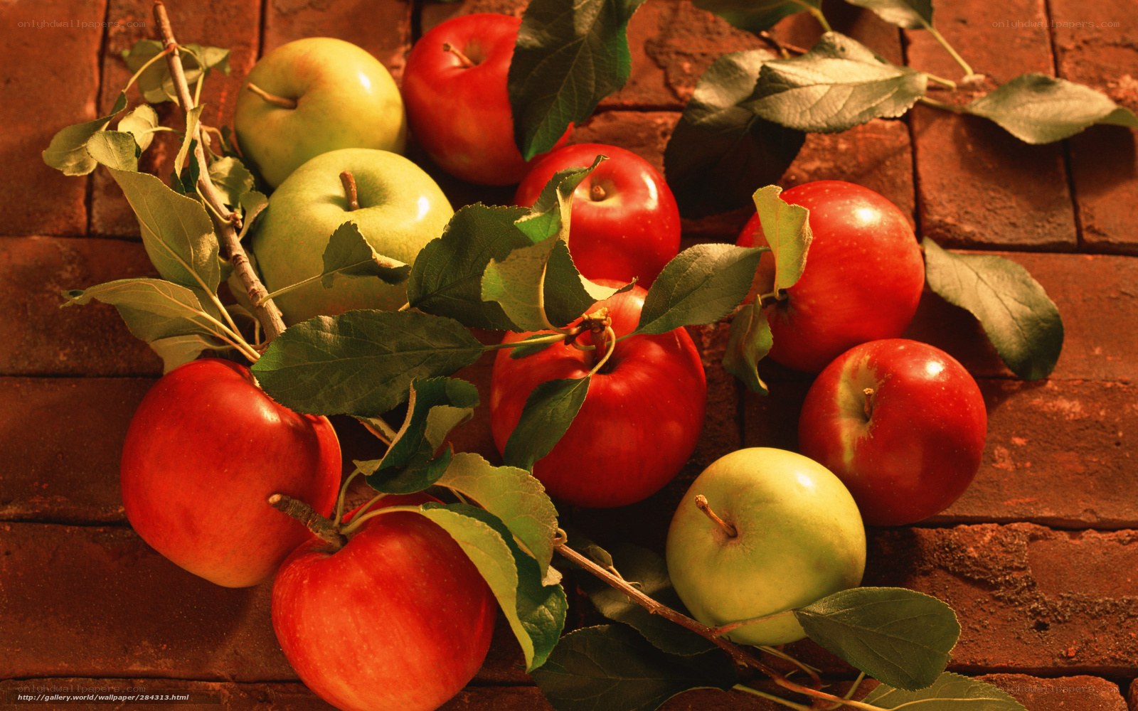 apples on brick surface
