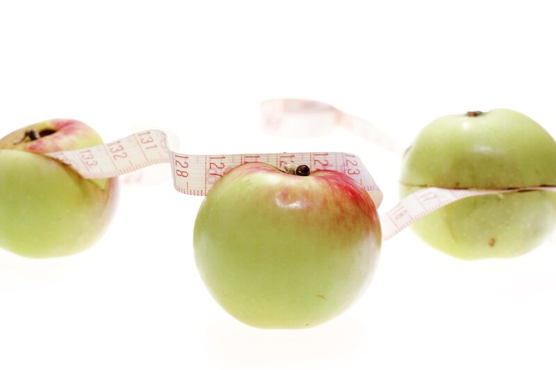apples with measuring tape